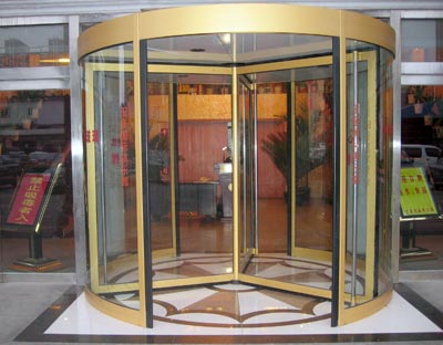 金色氟碳噴涂手動三翼旋轉門